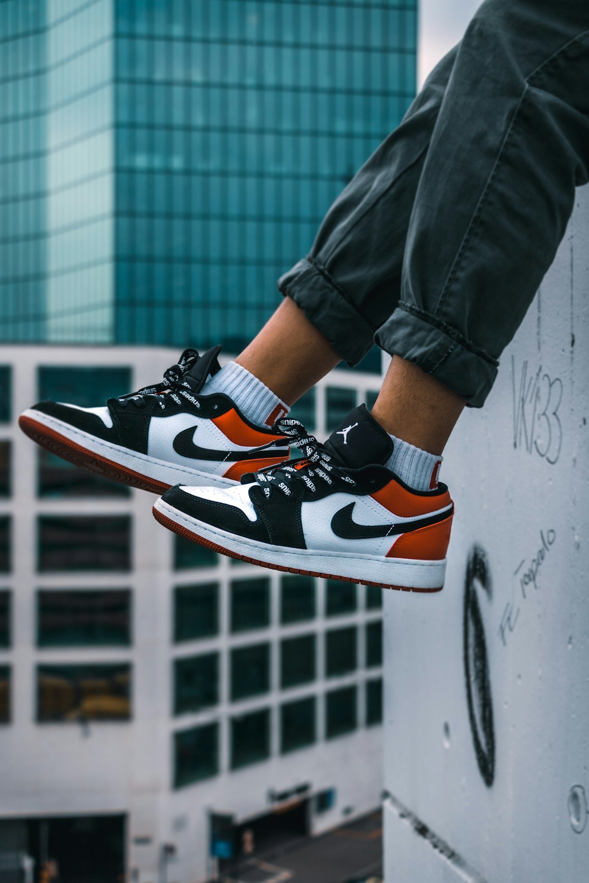 Colourful sneakers photo on left half of contact section